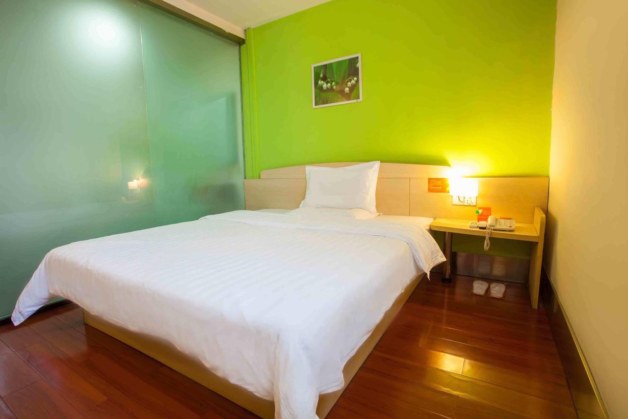 7 Days Inn Yangjiang Xinyue International Studio Rum bild