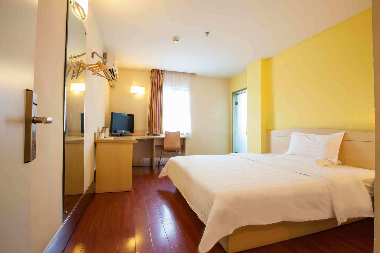 7 Days Inn Yangjiang Xinyue International Studio Rum bild