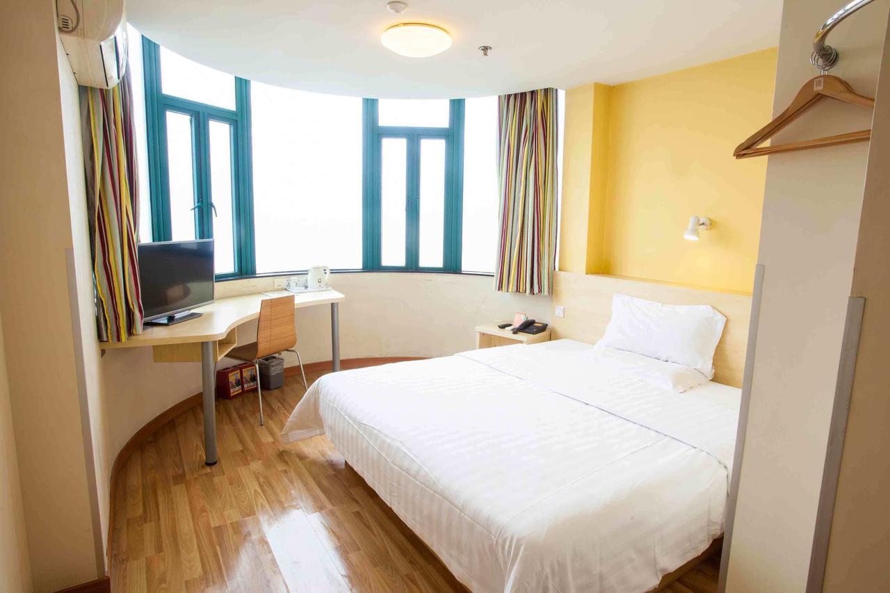 7 Days Inn Yangjiang Xinyue International Studio Rum bild