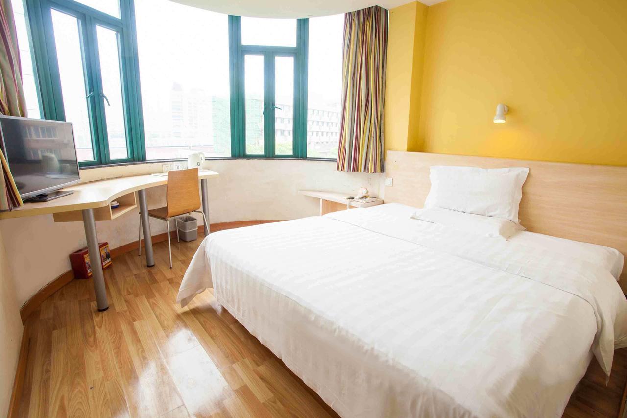 7 Days Inn Yangjiang Xinyue International Studio Rum bild