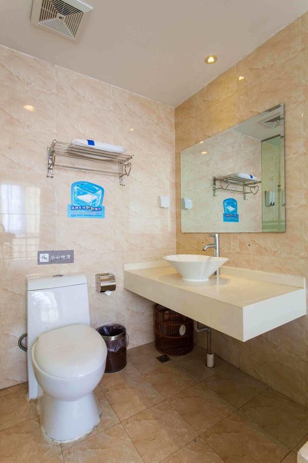 7 Days Inn Yangjiang Xinyue International Studio Rum bild