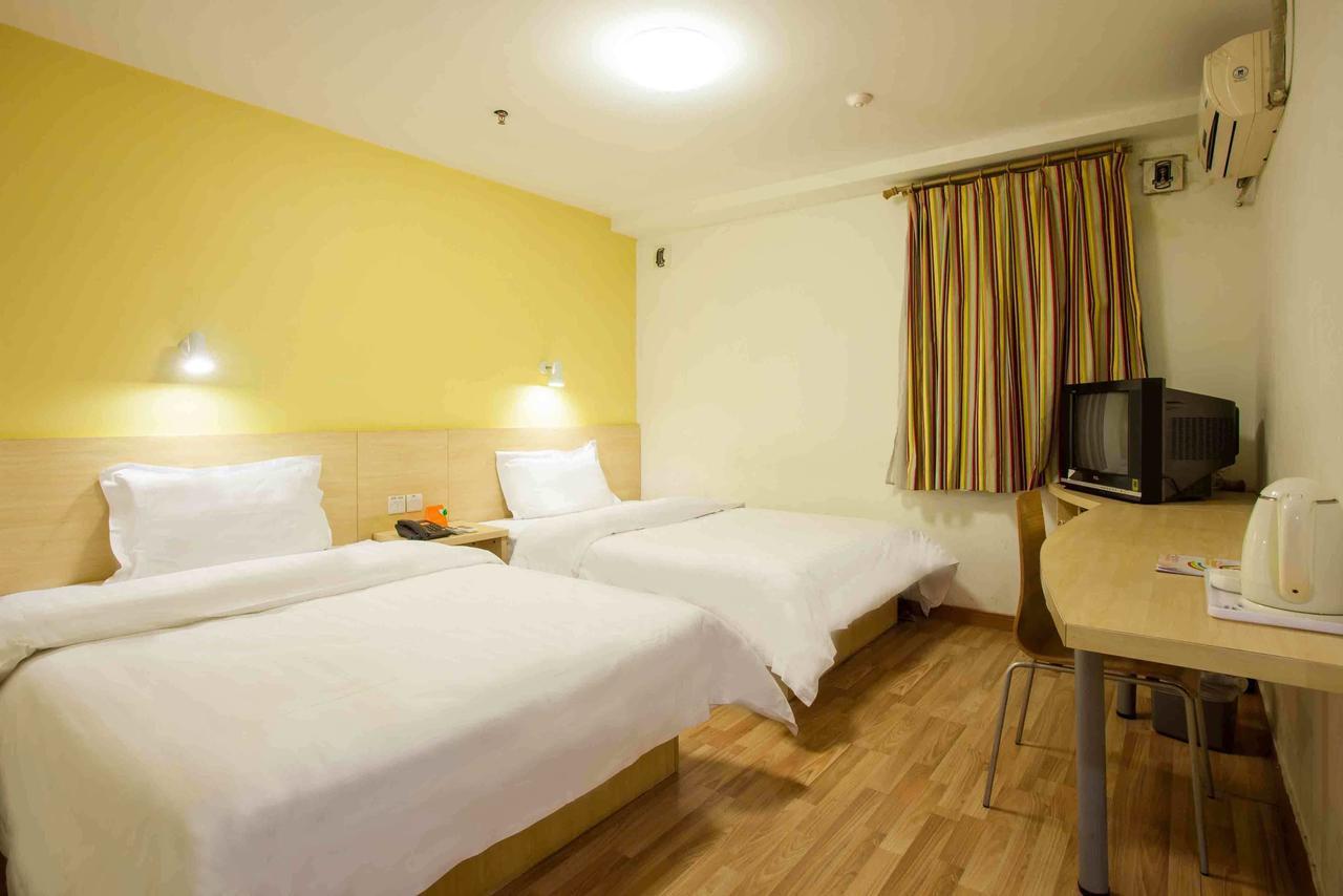 7 Days Inn Yangjiang Xinyue International Studio Rum bild