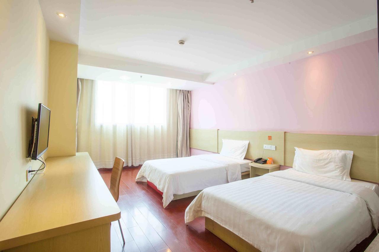 7 Days Inn Yangjiang Xinyue International Studio Rum bild